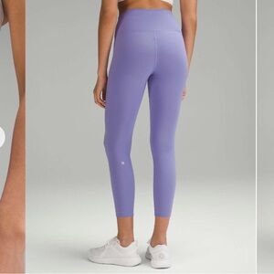 NWT Lululemon Wunder Train High-Rise Tight 25"
Dark Lavender Size 12